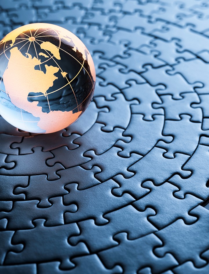 Globe on puzzle pieces
