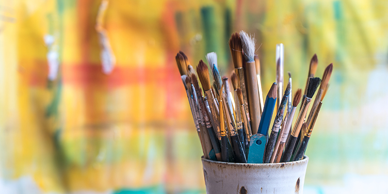 Paint brushes in a can