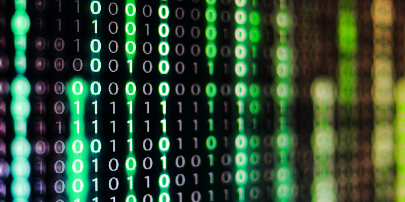 power of big data. binary code information bit on computer monitor screen display