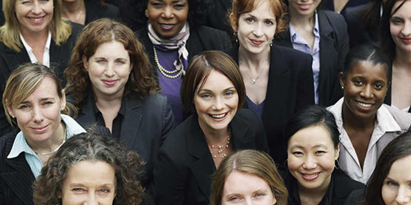 Elevated view of a group of smiling multiethnic businesswomen