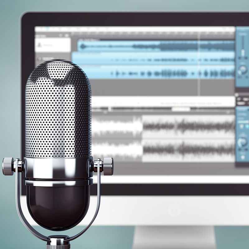 Podcasting microphone and computer screen