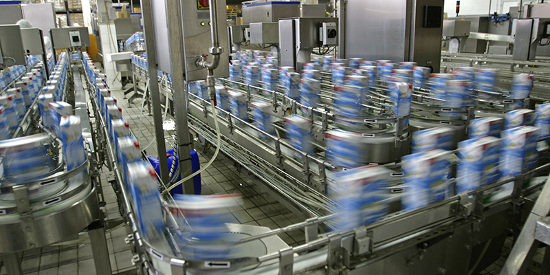 Automated production line in modern dairy factory