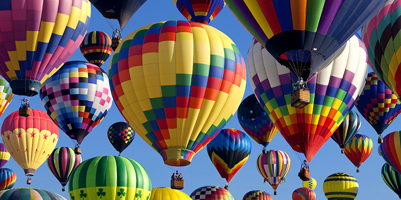 Composit of the mass ascension launch of over 100 colorful hot air balloons at the New Jersey Ballooning Festival in Whitehouse Station, New Jersey
