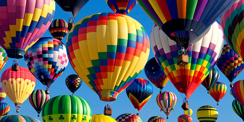 Composit of the mass ascension launch of over 100 colorful hot air balloons at the New Jersey Ballooning Festival in Whitehouse Station, New Jersey