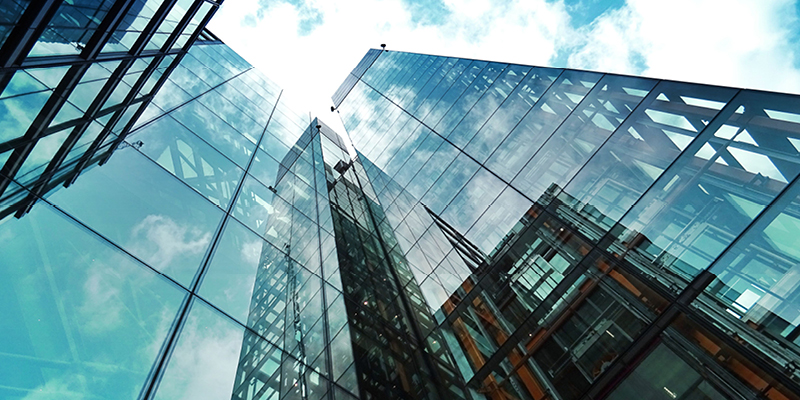 Upward view of glass skyscrapers