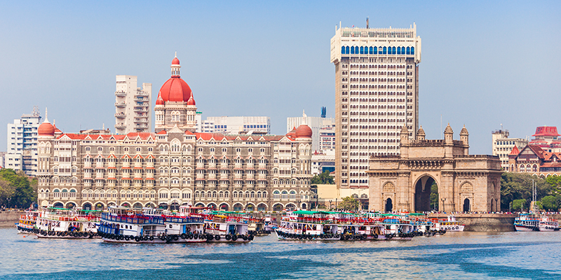 The Gateway of India and boats as seen from the Mumbai Harbour in Mumbai, India