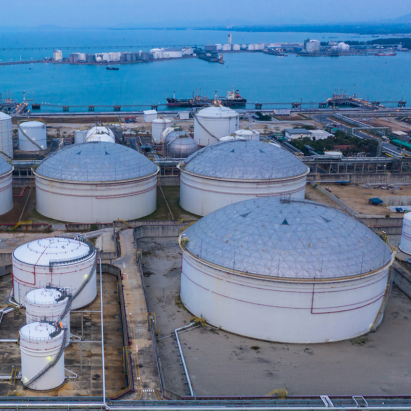 Oil and petrochemical tank, storage of oil and petrochemical products ready for logistic and transport business. Aerial view.