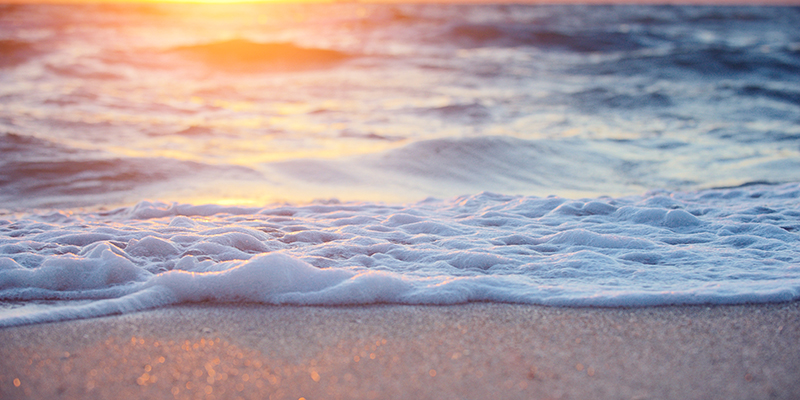 sea waves close up at sunrise