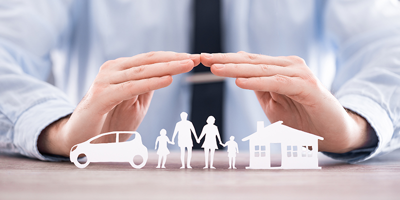 Insurance protecting family health live, house and car concept. Cut elements from paper that symbolize the coverage.