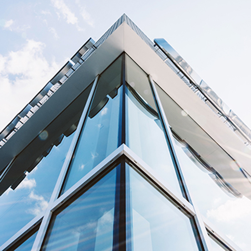 Exterior of glass building, corner view