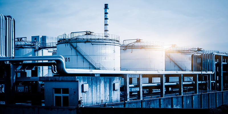 storage tanks and pipelines at the oil refinery,blue toned image.