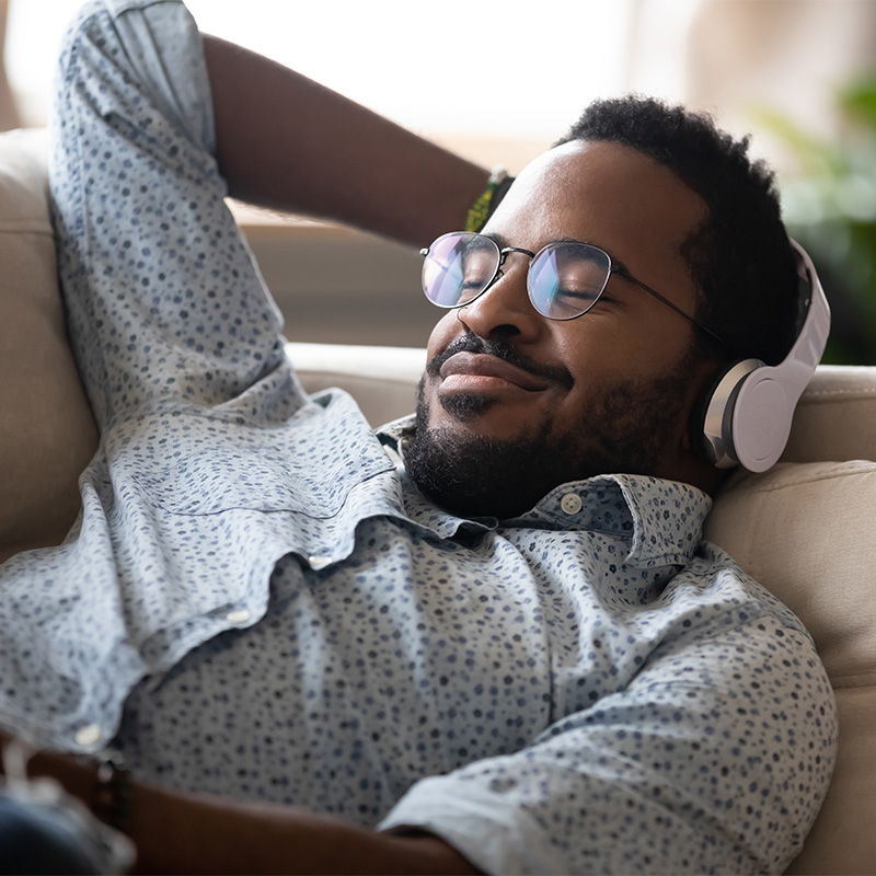 Man listening to music with earphones