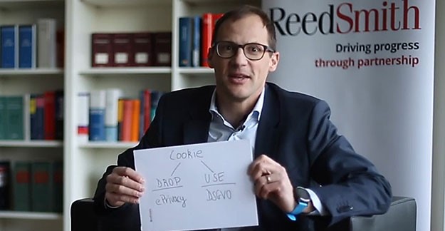 Andres Splittgerber holding sign re: Cookies and GDPR