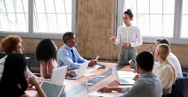Woman leading a meeting in conference room