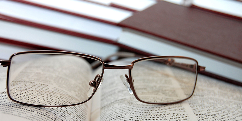 glasses on book