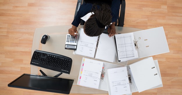 Overhead view of woman working at a desk