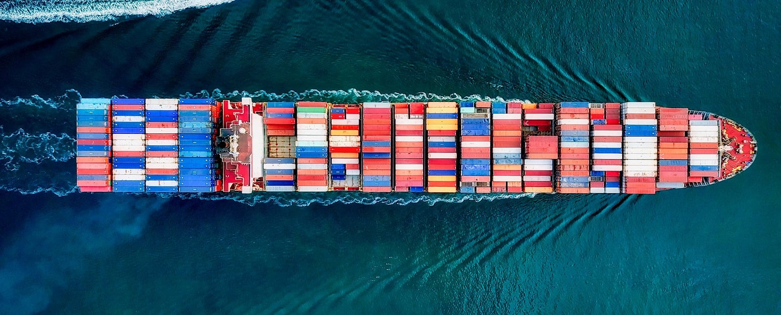 Overhead shot of cargo ship on the water