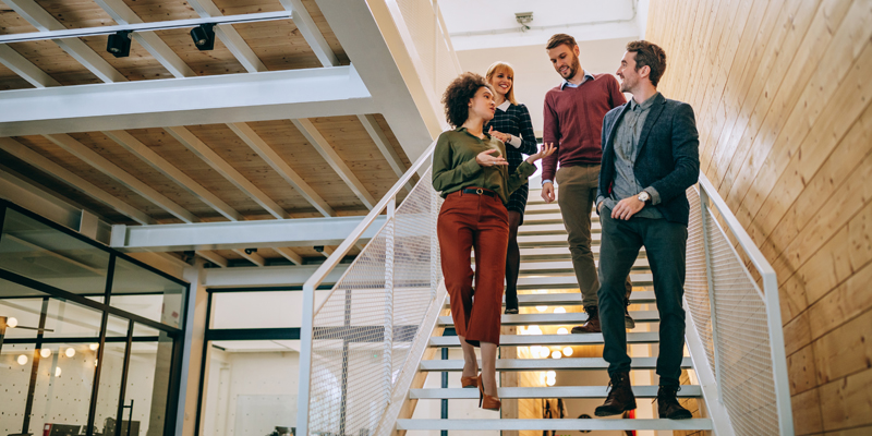 group of coworkers going down stairs