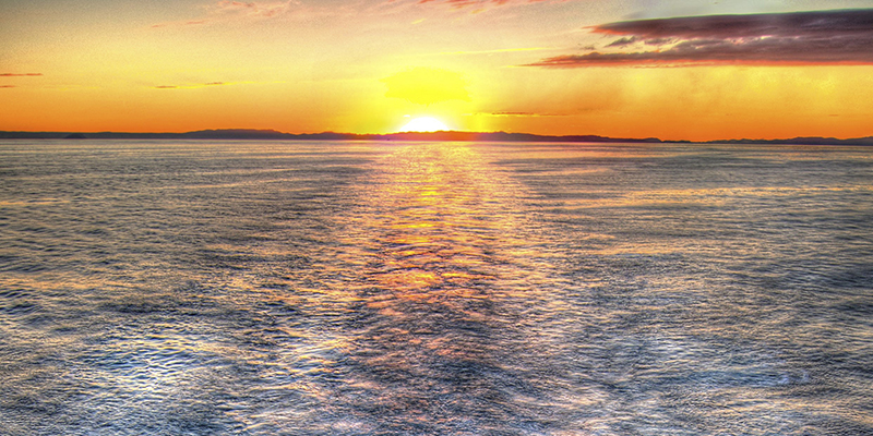 sunset over ocean ripples