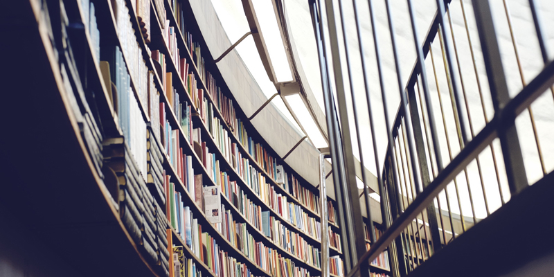entire wall full of book shelves