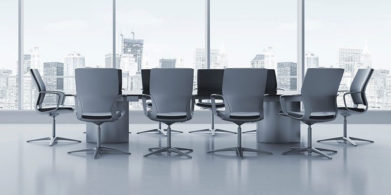 chairs around meeting table