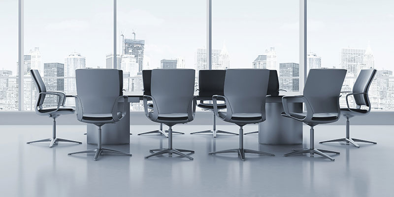 chairs around meeting table