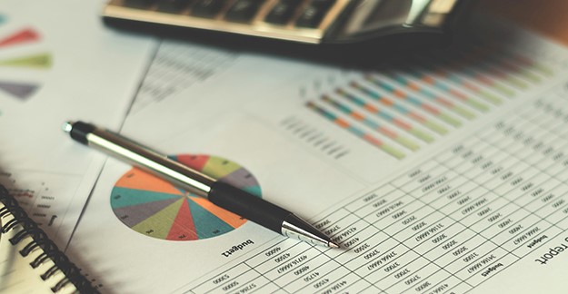 Financial charts with pen