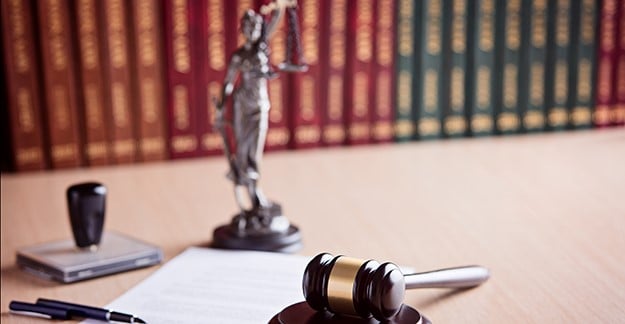 Gavel and statue of lady justice