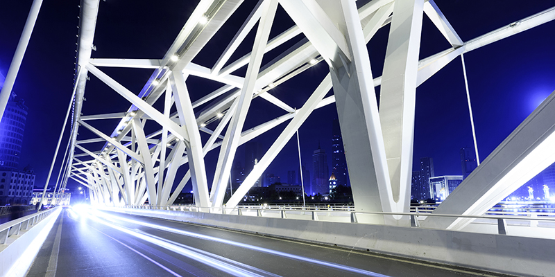 modern bridge with empty road floor at night