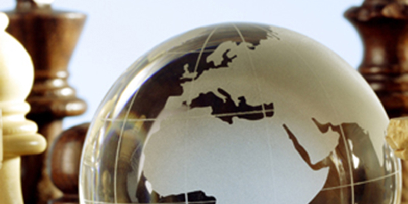 Glass globe on chess board