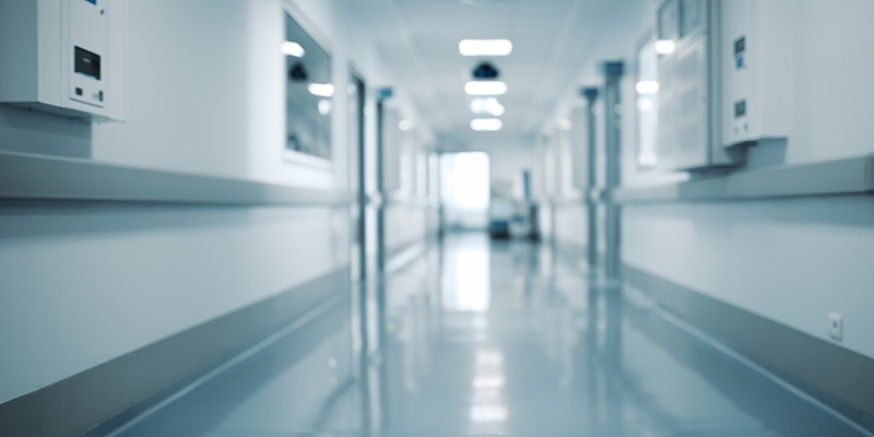 Modern building hallway, unfocused background.