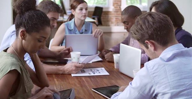 People meeting with laptops