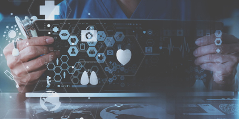 doctor hand working with modern laptop computer in modern office with virtual icon diagram