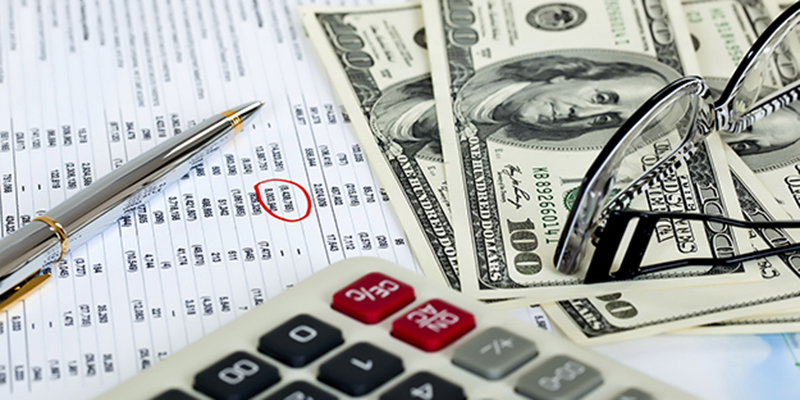 Financial statement, money and calculator