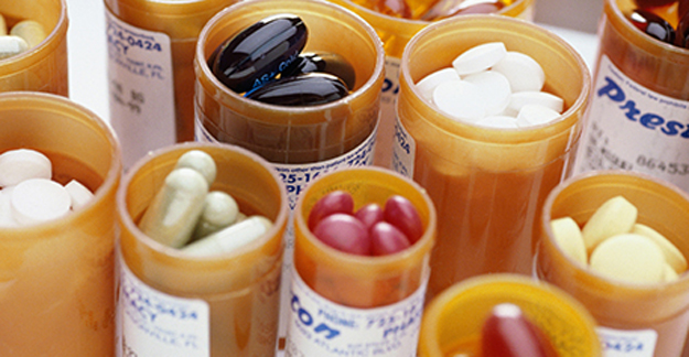 Medication bottles full of pills