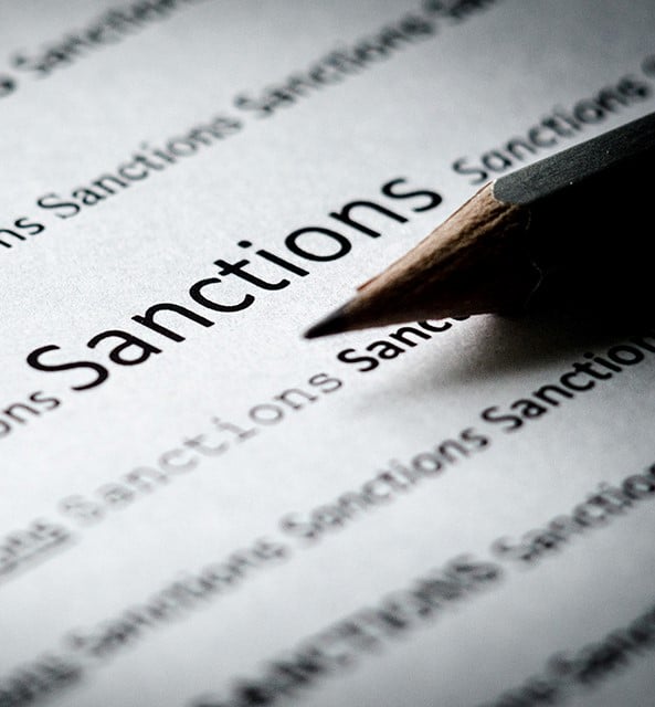 Sanctions word and pencil