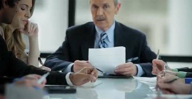 People sitting around conference table