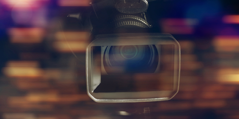 professional video camcorder in studio with blurred background